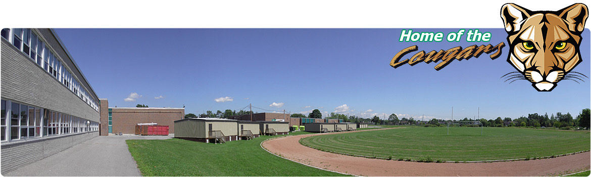 Image of school track and portables. Text in top right hand corner reads "Home of the Cougars" 